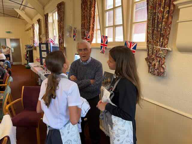Jim talking with Tilly & Bethany