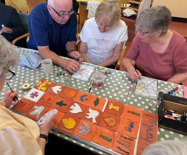 Pentecost tiles and stained glass
